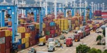 Firms stock up amid port congestion, rising freight rates