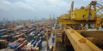 Metamorphosis from a transhipment hub to a maritime hub