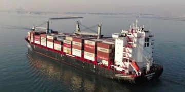 Containership charter rates storm to new highs